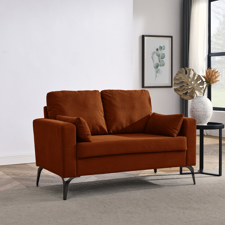 Orange top leather loveseat